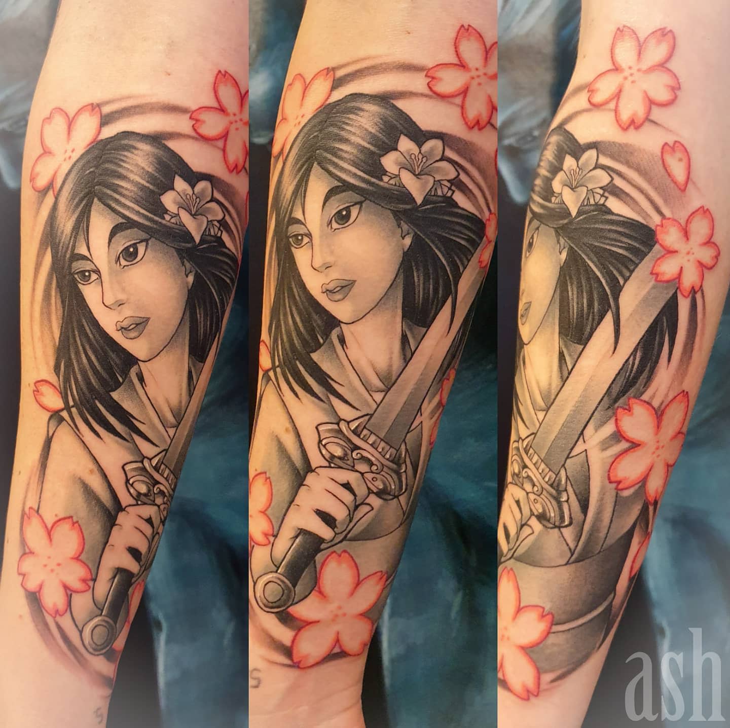 Tattoo of Mulan with a sword and flowers on an arm